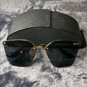 Prada polarized gold sunglasses